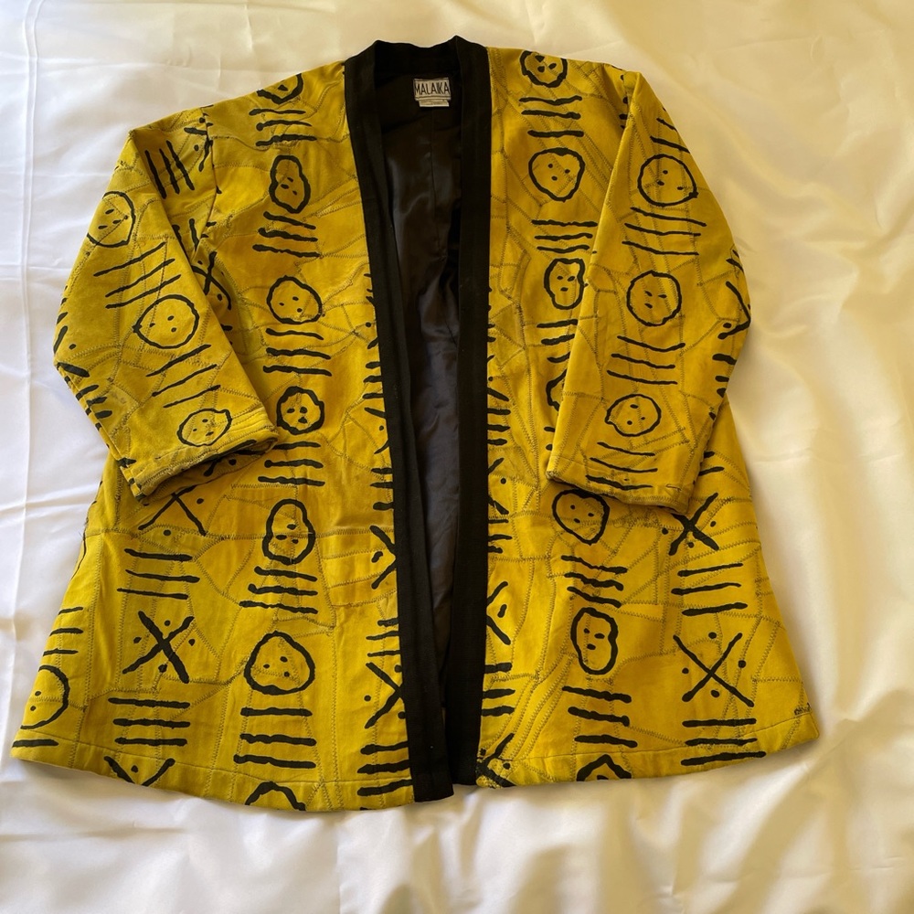 Vintage yellow and black leather jacket from Malaika, size large